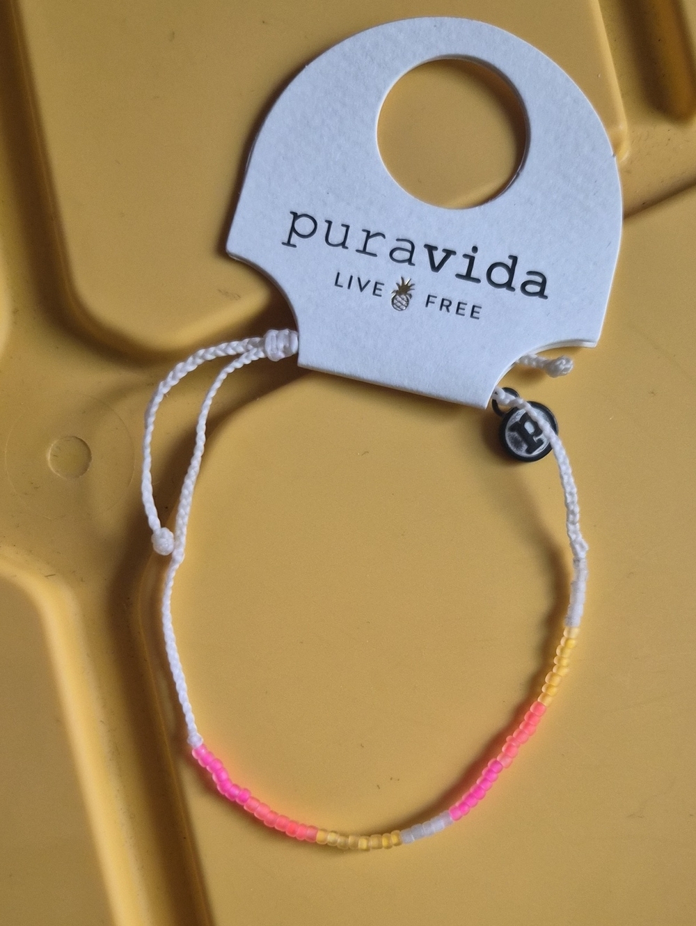 Pura Vida neon ombre White Bracelet with Neon Pink & Yellow Beads